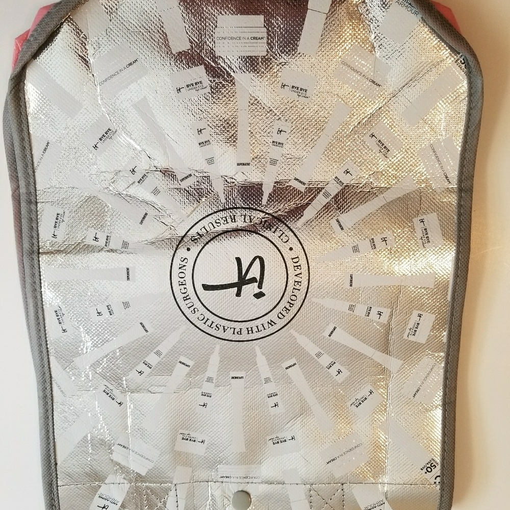 IT Bag. Snap closure with handles.